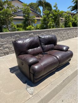 Brown Leather Power Reclining Loveseat - $50