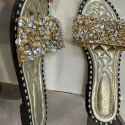 Stylish gold slippers 