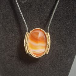 Gorgeous Agate Pendant Necklace With Banding Of Shades Of Orange, Red, White & Brown Set In Brass Frame On 18" Black Cord