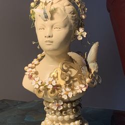Embellished statue, $50.00or BO