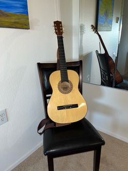 999 guitar with strap