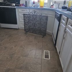 It is a fire screen to go in front of your fireplace. I think it's thirty two inches long or it could be thirty six inches long.I'm not a hundred perc