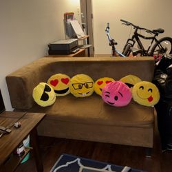 Brown Sofa With Emoji Pillows 