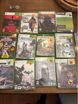 Xbox 360 Game Discs in Green Case