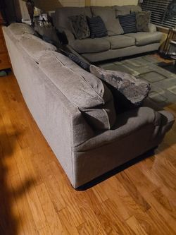 Taking Best Offer. Set of two 8 foot sofas/couches, good condition. No stains or rips. Taking Best Offer.