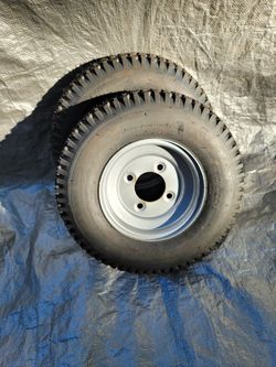 Pair (2) 4.80/4.00-8 NHS 4-ply tires on a 4-lug wheel