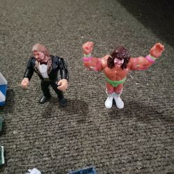 Million Dollar Man & Ultimate Warrior action figures