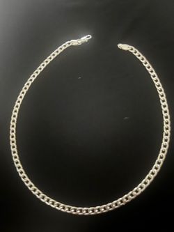 Beautiful 19 Inch 925 Sterling Silver Curb Link Chain Necklace. This piece has a lobster claw clasp and a flat link design.