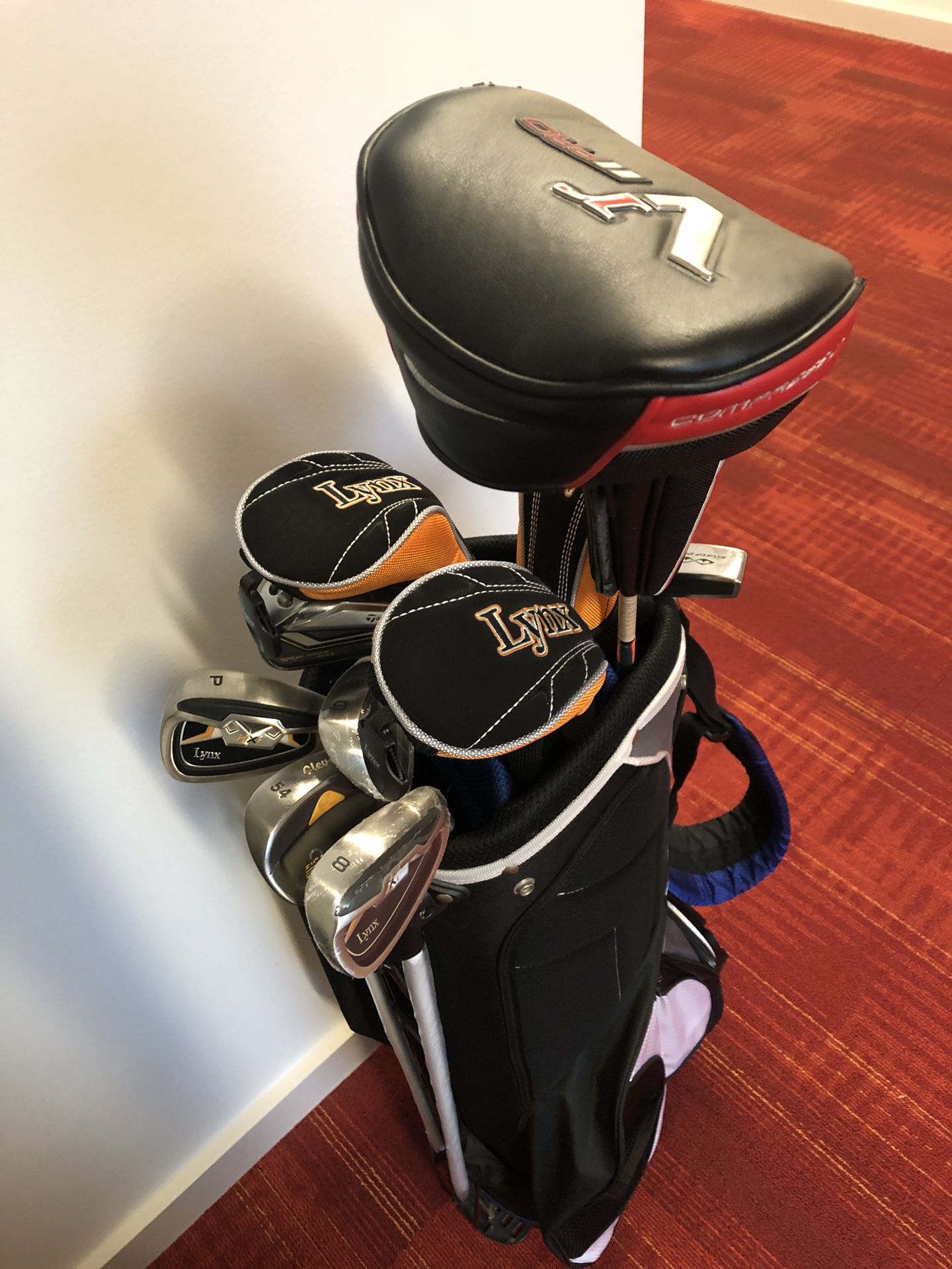 Power bilt golf bag with clubs