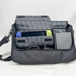Nintendo Switch + 2 games + Carry bag