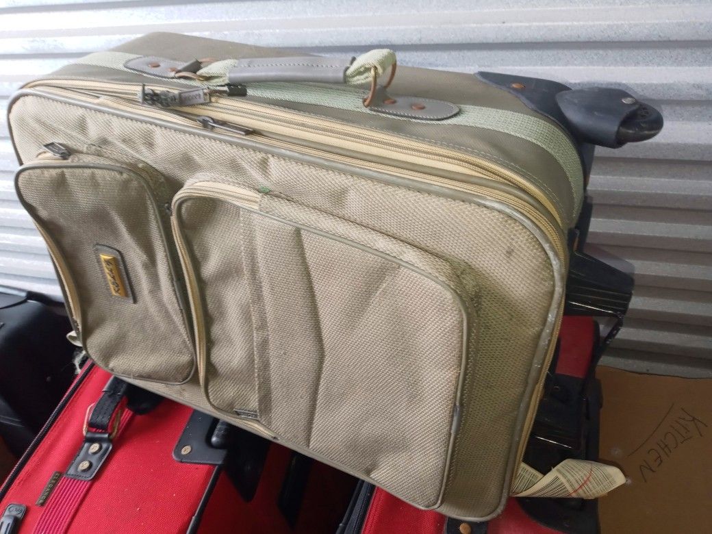 Suitcase. Medium Size With Wheels.