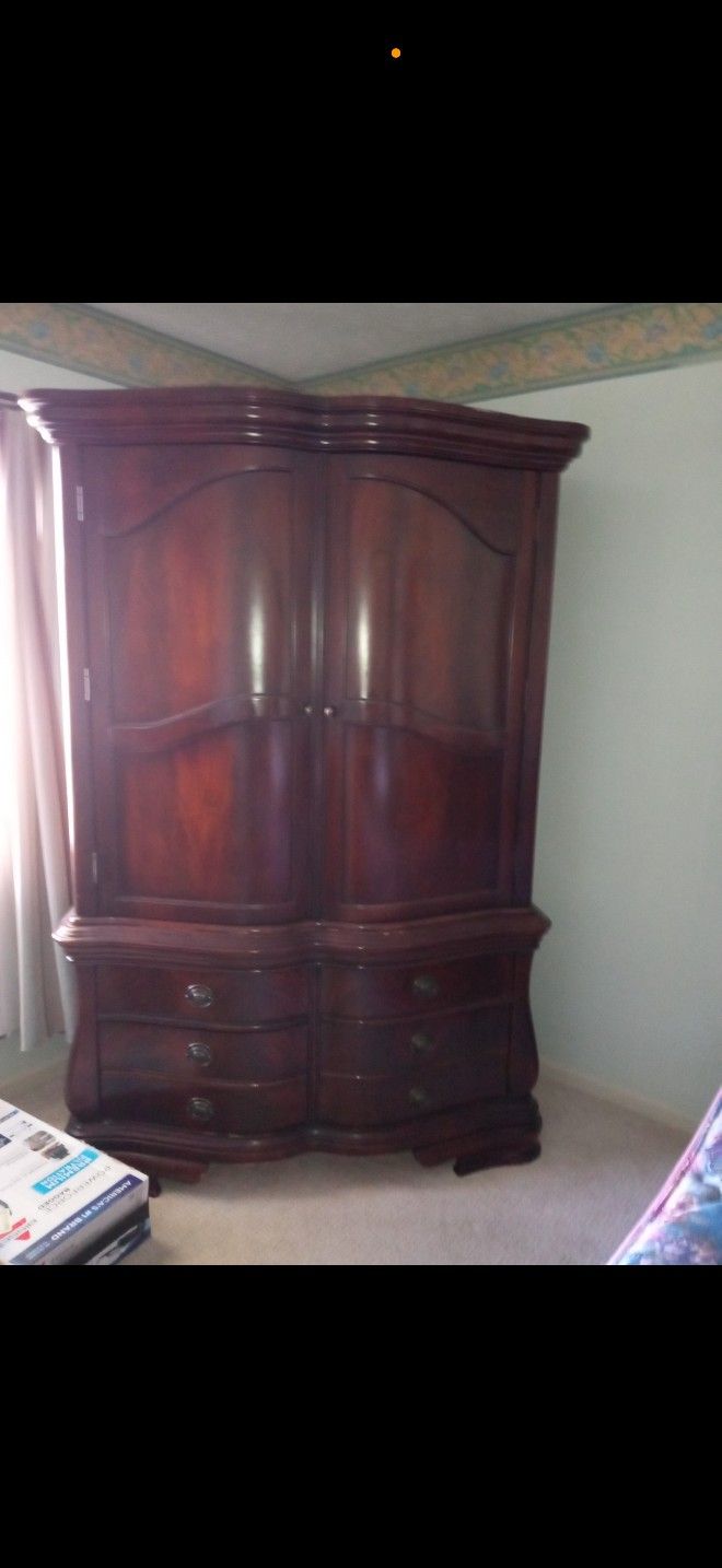 King Sleigh Bed, Dresser With Mirror, two End Tables and Armoir Set