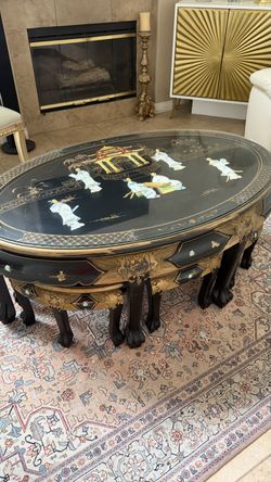 Asian style coffee table with Glass top and seven little tables underneath