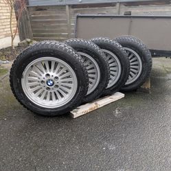Set of 4, Bmw Studded Tires and Wheels. 215/55/16 Very Good condition