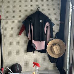 Size small, size 10 women’s wet suits