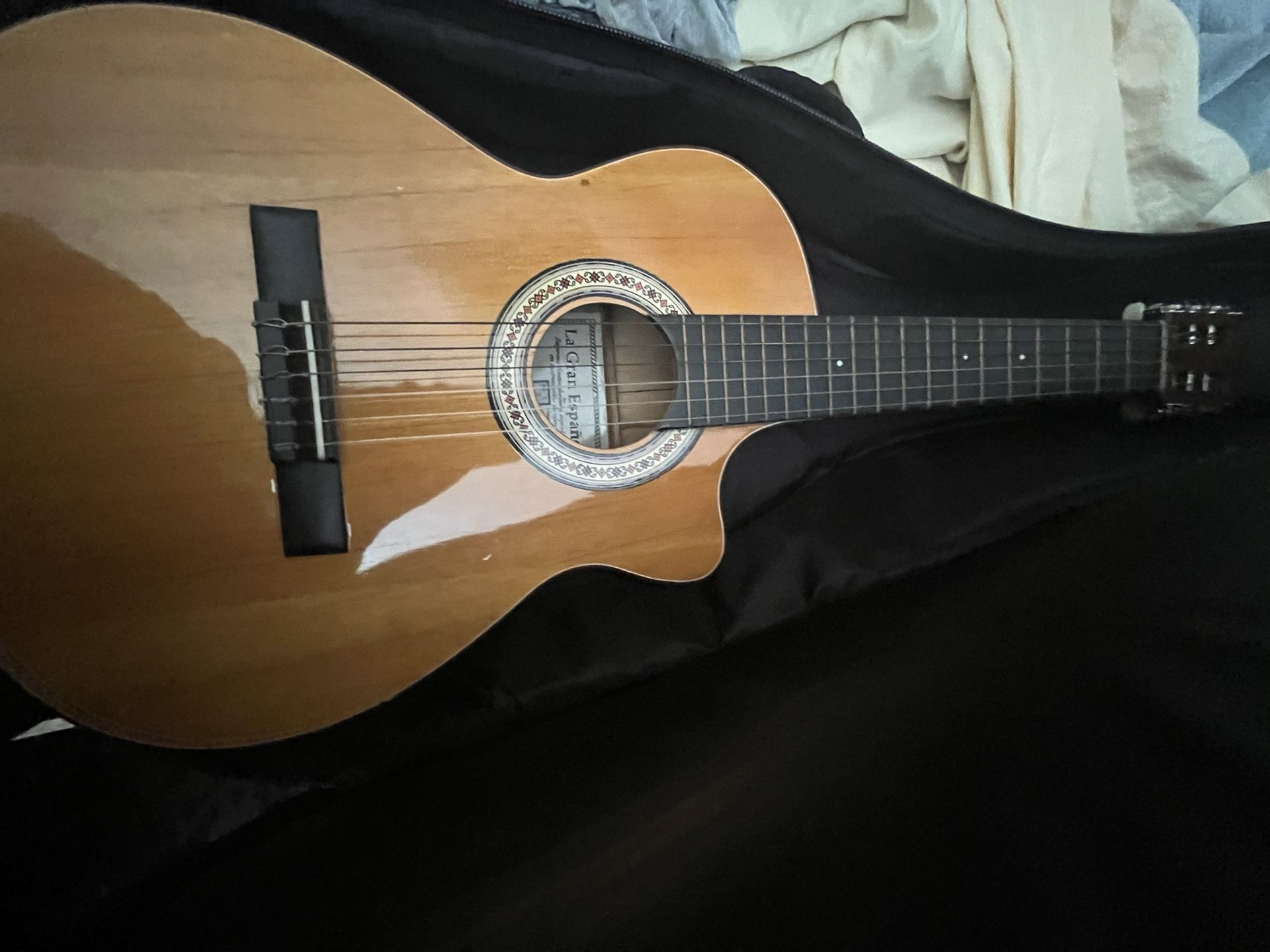 musical cedar brown acoustic guitar 