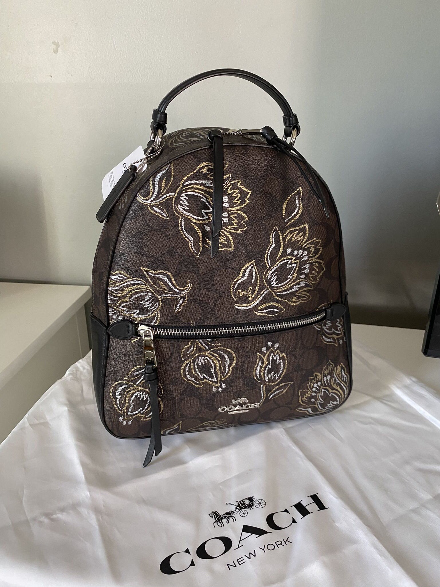 coach brown floral backpack Court In Signature Canvas With Print Sand Multi Coach Jordyn Backpack In Signature
