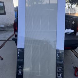 RELIABILT Gibraltar Max 36-in x 81-in Almond Steel Universal/ Reversible Surface Mount Security Screen Door