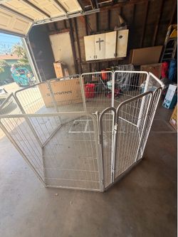 Corral metálico para mascotas