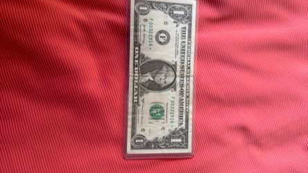 $1 bill with a star $50
