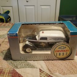 die cast metal of a 1937 chevy tx dept highyway patrol bank