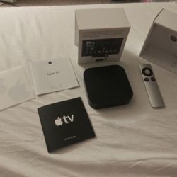 Apple TV with remote, directions, & box