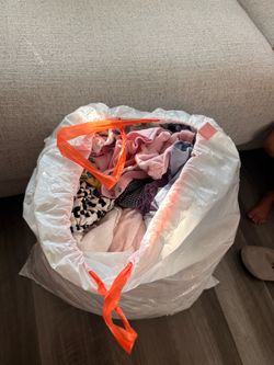 Bag of baby girl clothes