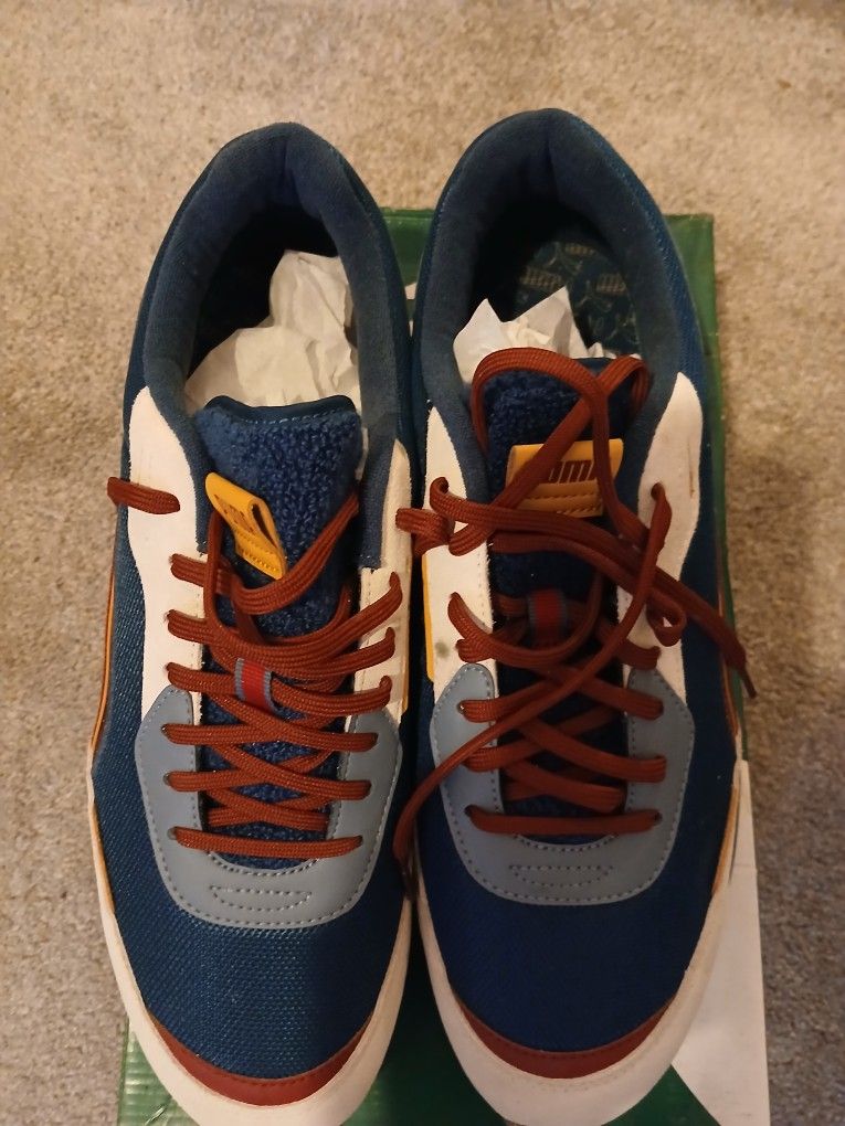 MULTI COLOR PUMA TENNIS SHOES/MEN 13