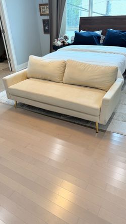 Creme velvet sofa