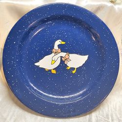 Plate of Geese made of metal