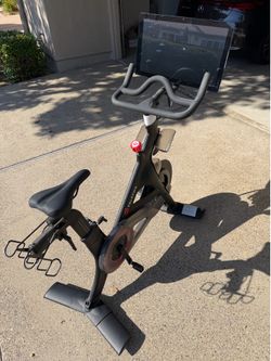Peleton bike, shoes and mat