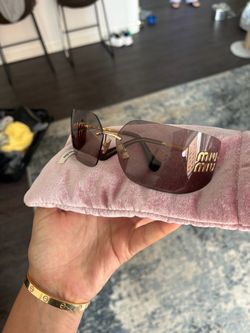 Miu Miu Rimless Sunglasses with Gold Hardware