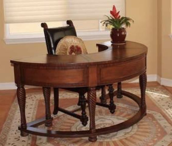 Crescent shaped leather top desk