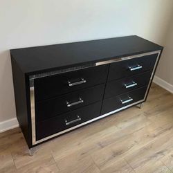 Black dresser with mirrored edge new assembled in box