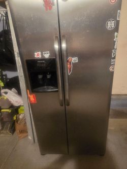 Stainless steel Frigidaire refrigerator with water line and ice maker, gently used, moving.
