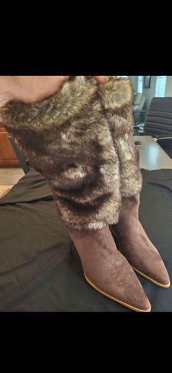 Women's Size 7 brown faux suede knee-high boots feature a plush faux fur trim and a distinctive buckle strap detail