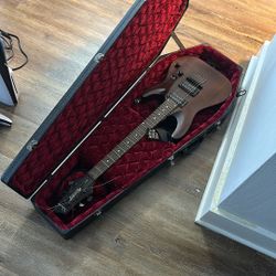 Diamond Series Schecter Electric Guitar with Coffin Case