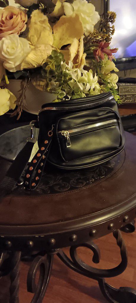 Black FAUX Leather Cross Body Bag With Silver Accessories And An Adjustable Strap