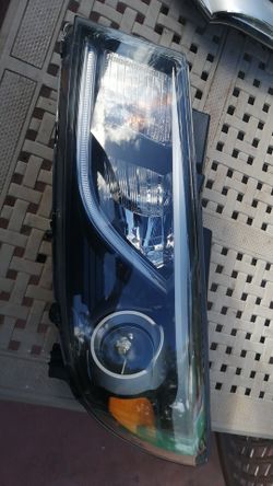 2015-2018 Kia Sedona headlight left side OEM