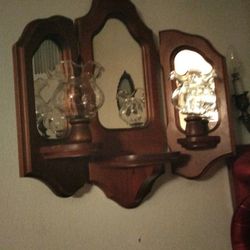 Vintage Handmade 3 Section Candle Sconce with Mirror Accents.

Normal wear MAY be seen. Scratches,nick's and dents MAY be seen. Cleaning MAY be needed
