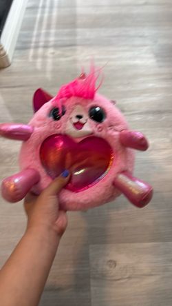 Pink plushie cat