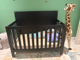 Black wooden crib