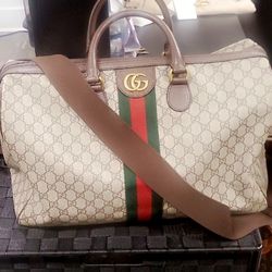 Authentic GUCCI  luggage tote  only used twice, best offer
