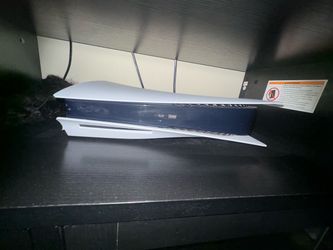 PlayStation 5 with controller