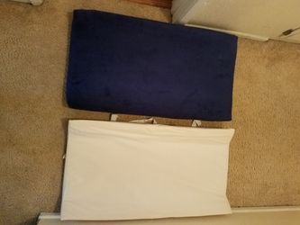 2 changing pads. One with soft cover. Great for changing table or any surface