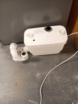 Saniflush toilet set with upflush pump included