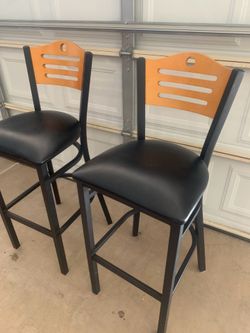 Black and wood bar chairs