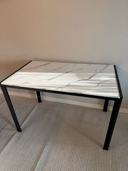 Durable faux marble tabletop and metal frame