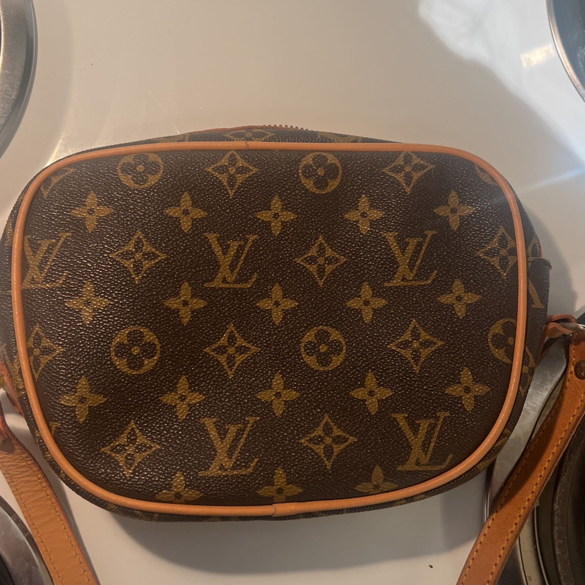 Louis Vuitton Orsay Clutch for Sale in Spring, TX - OfferUp