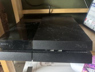 PS4 W/ 2 Controllers And 10 Games